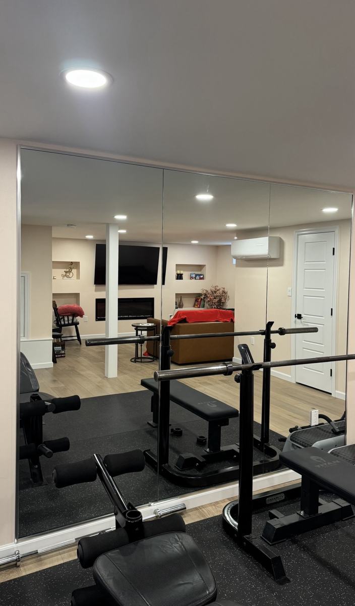 Custom home gym mirror wall