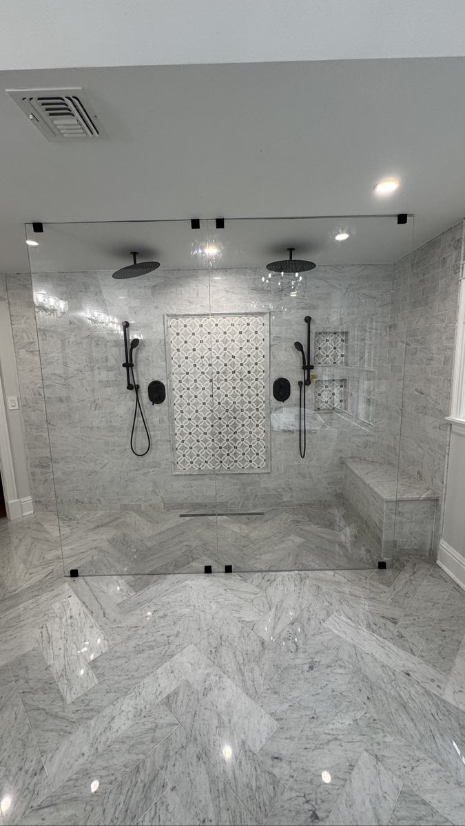 Frameless splashguard panels with matte black hardware